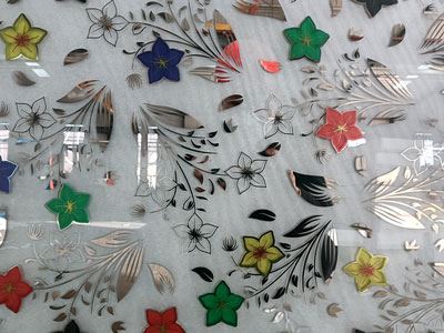 Verre avec film titane