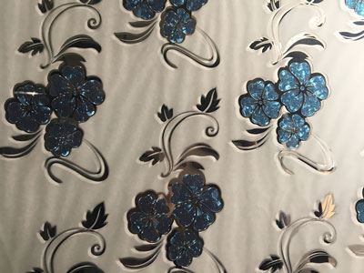 Verre avec film titane